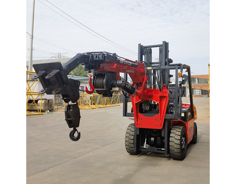 BOB-LIFT 7 ton forklift fly jib crane with a heavy-duty hook block, mounted on a forklift in the factory yard